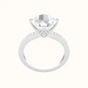 Micropave Engagement Ring With Petal Compass Prong Head